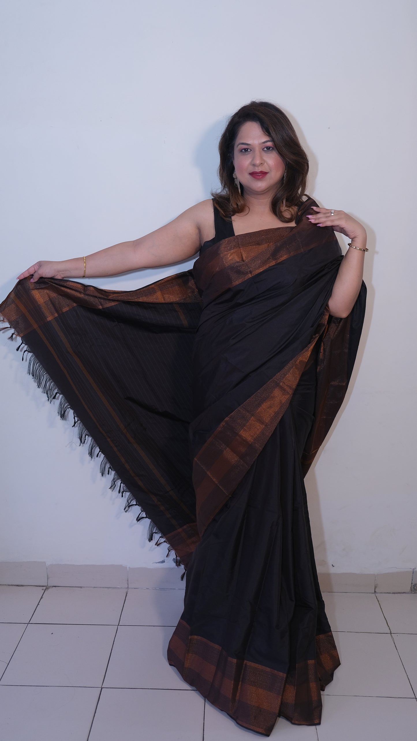 Elegant Black Semi-Silk Kuppadam Saree with Copper Zari Border 