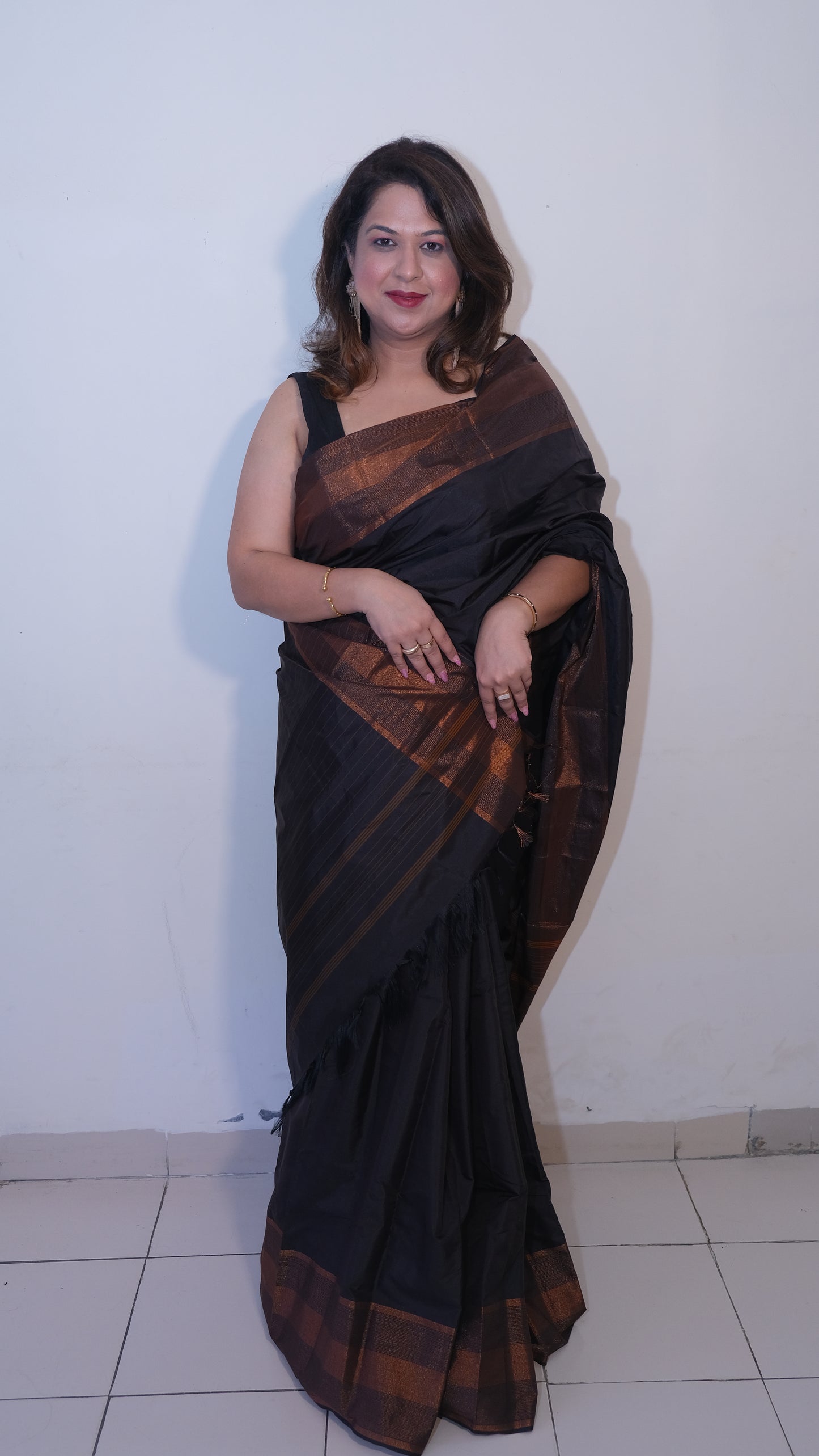 Elegant Black Semi-Silk Kuppadam Saree with Copper Zari Border 