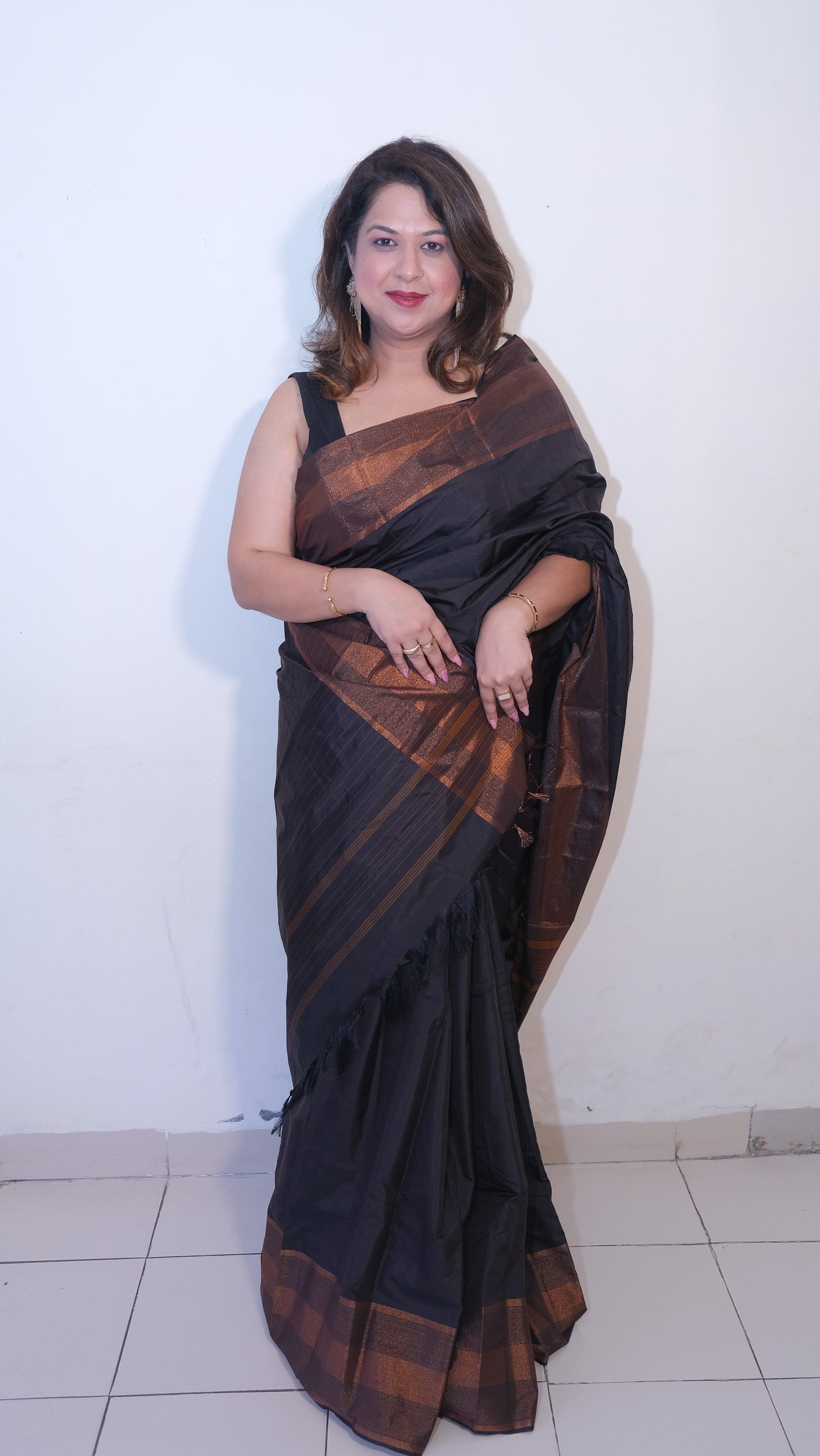 Elegant Black Semi-Silk Kuppadam Saree with Copper Zari Border &nbsp;