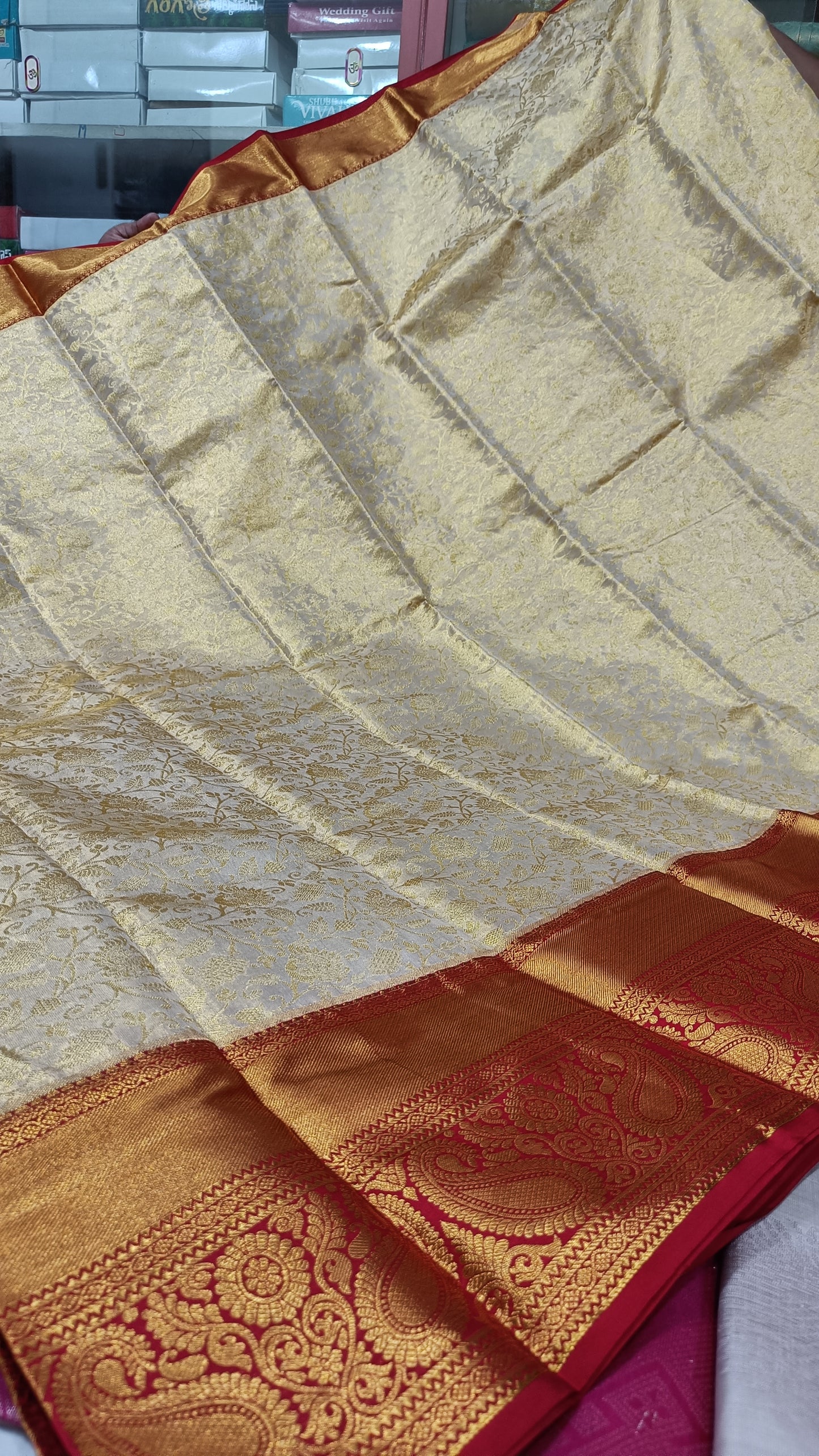 Exquisite Gold Brocade Saree with Rich Red Border